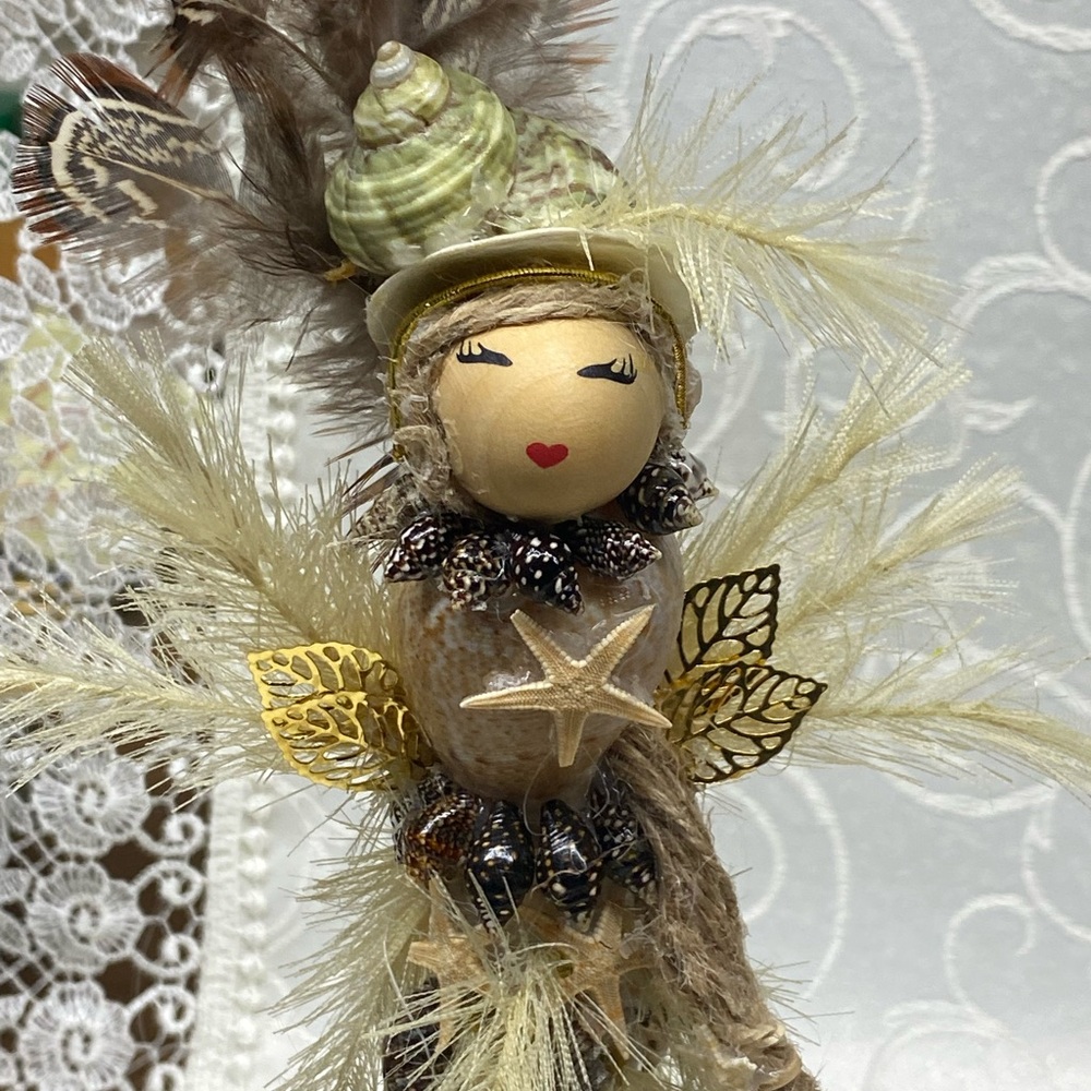 Artistic Feathered Home Sculpture